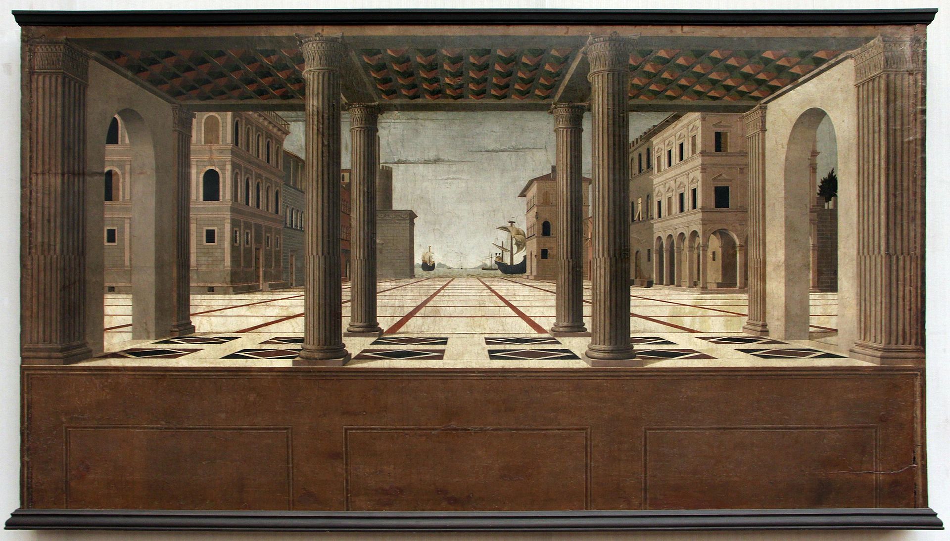 Veduta di città ideale (1477 circa), esposta a Berlino, nella Gemäldegalerie. Autori probabili Francesco di Giorgio Martini e Pietro Orioli.